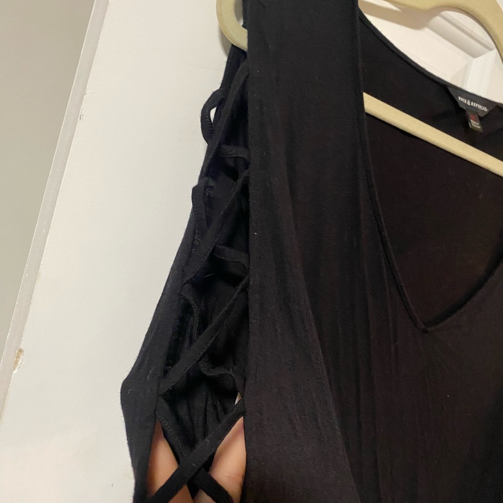 Black shirt with open sleeve slits